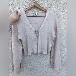 Tan ribbed front tie cardigan with bell slit sleeves